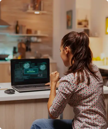 Woman using a laptop with internet security software in Australia